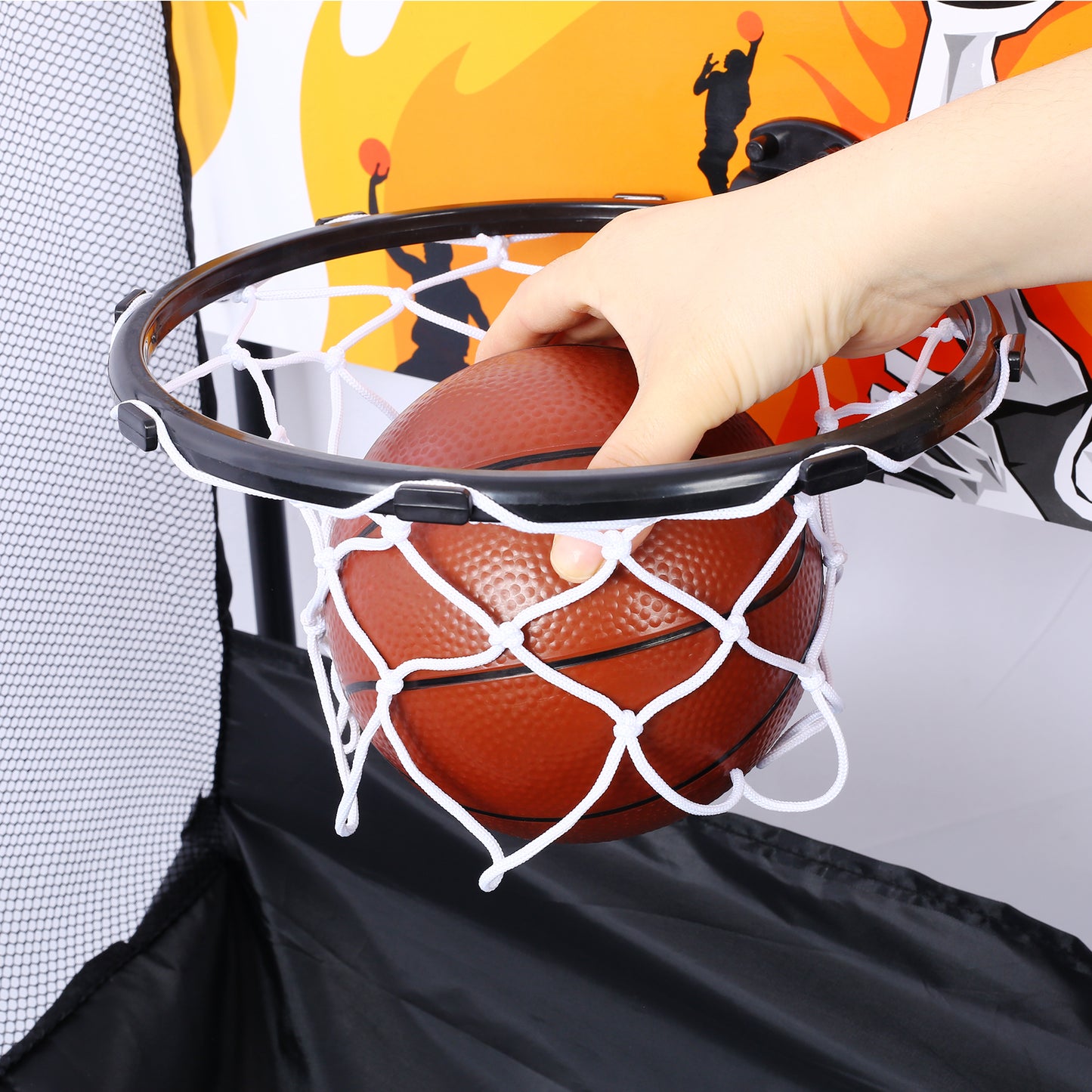 Childs toy basketball with net ready for a shot into the hoop