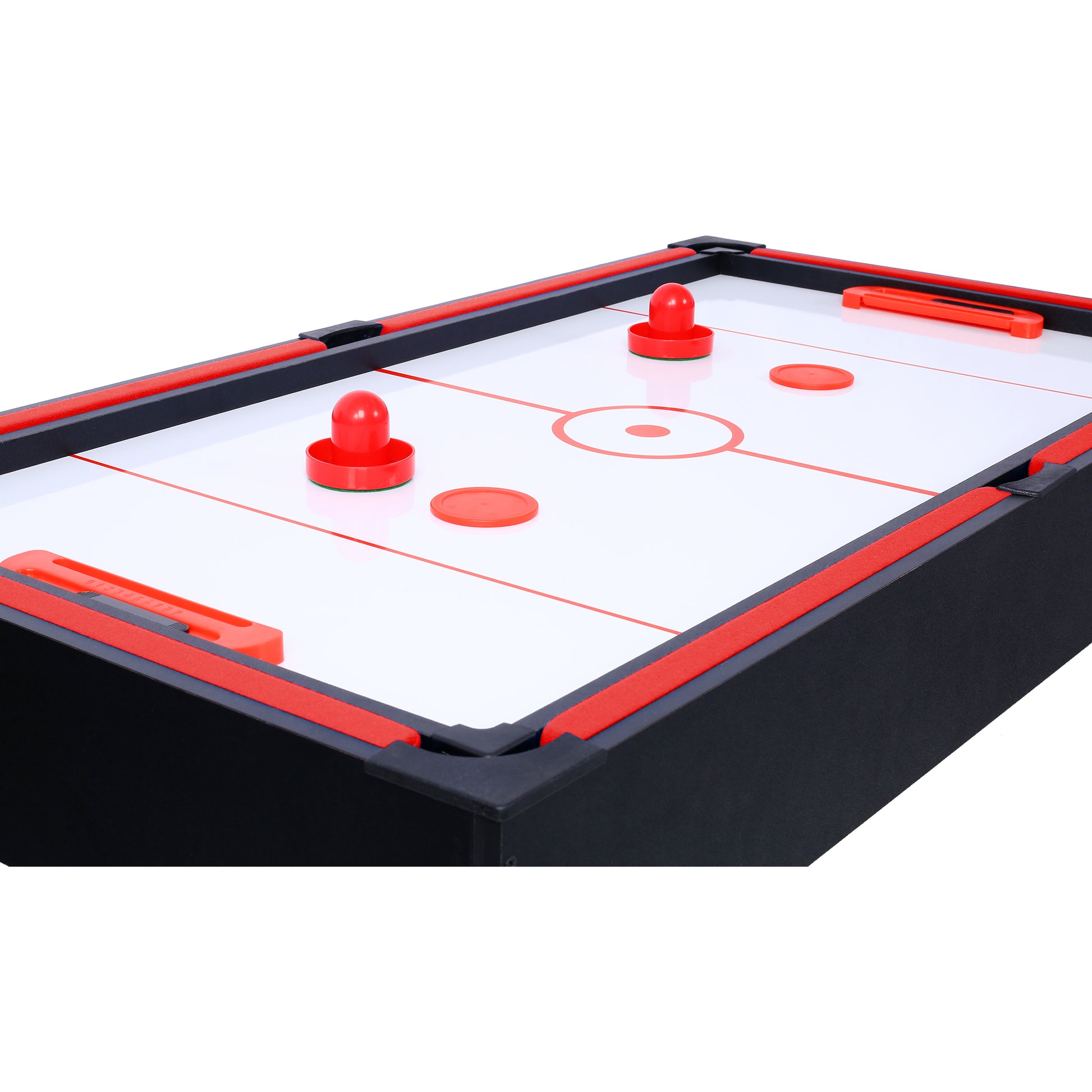 Compact air hockey table with black and red accents featuring pucks and paddles