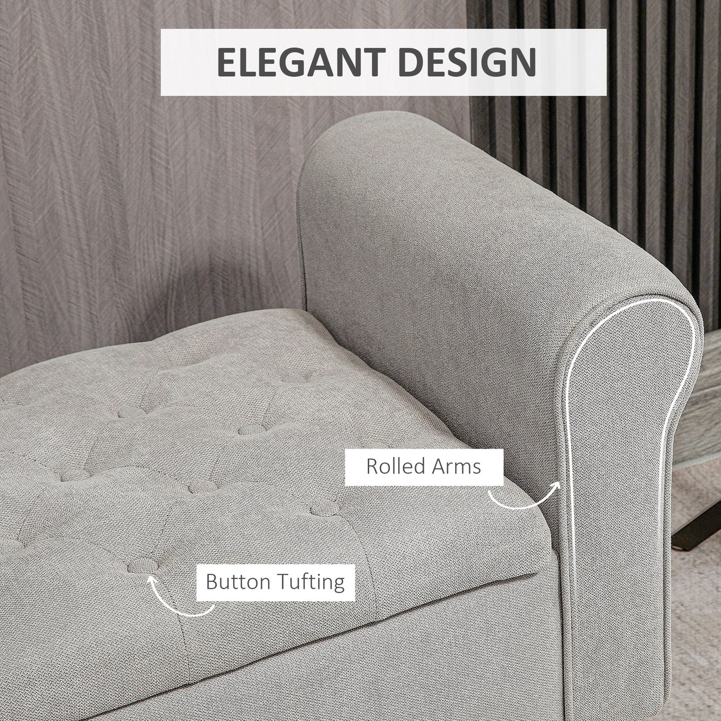 Gray fabric sofa with button tufting and elegant rolled arms