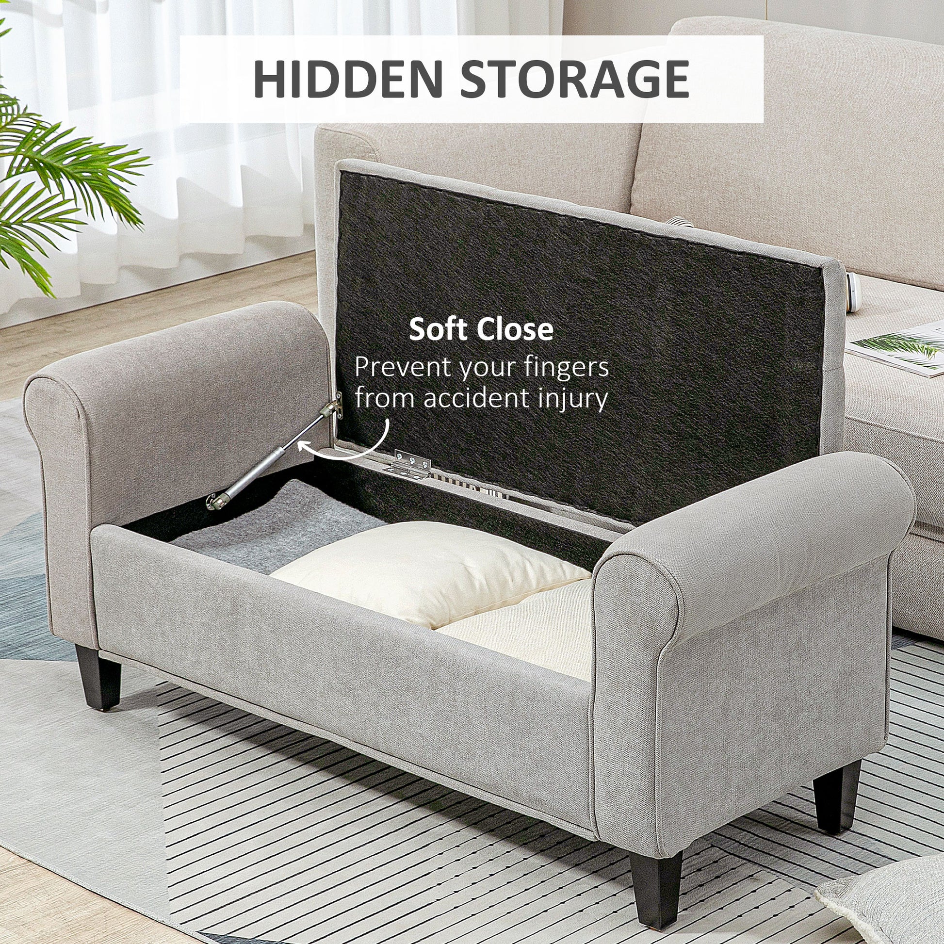 Grey fabric storage bench with plush cushions and a softclose lid