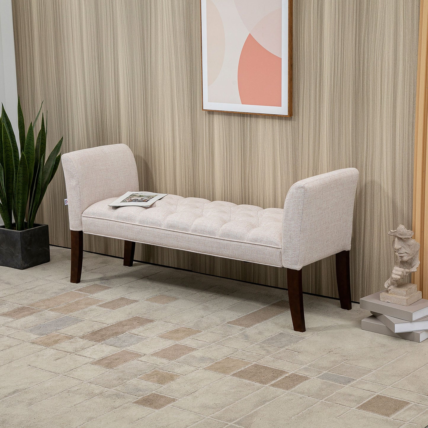 Tufted beige fabric bench with dark wood legs