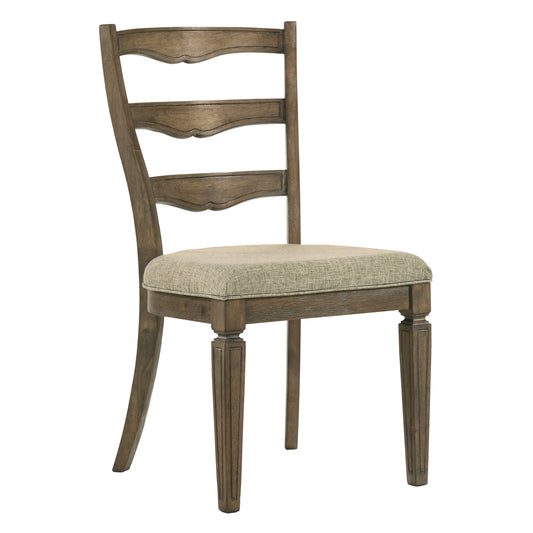 Classic wooden dining chair with a textured beige upholstered seat and carved legs