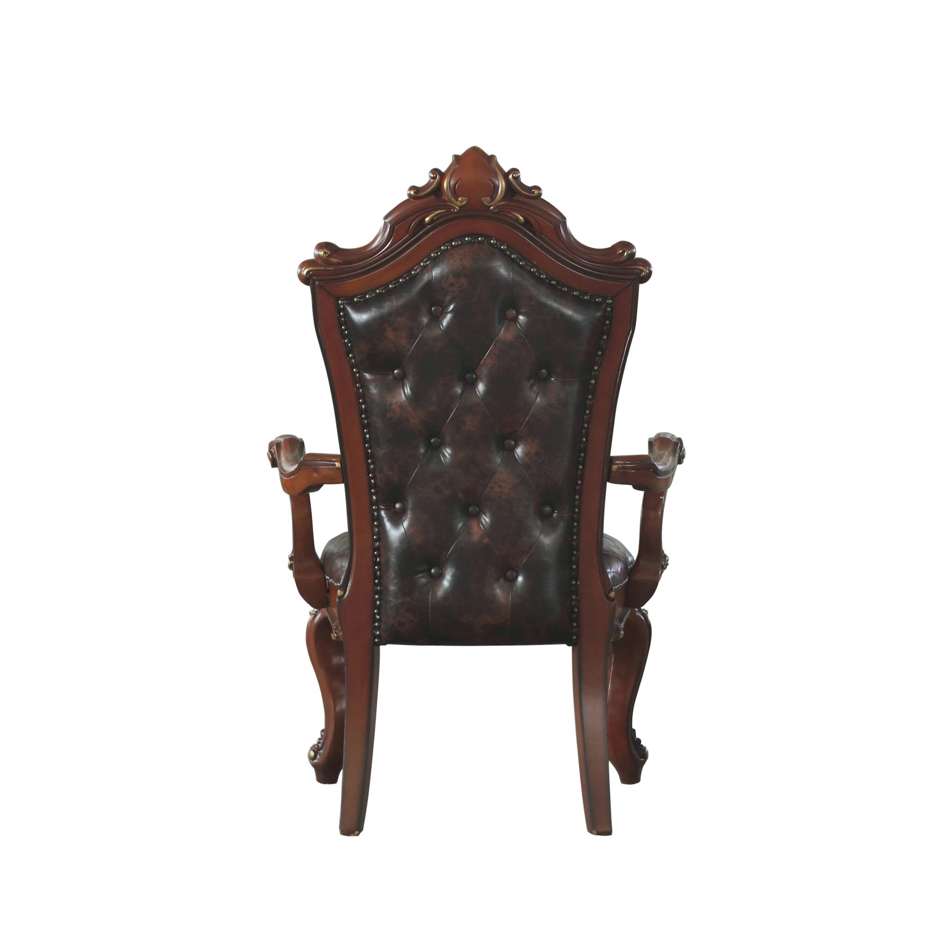 Traditional dark brown leather executive chair with tufted backrest and ornate wooden frame