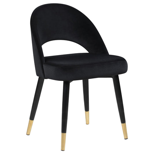 Black velvet accent chair with curved back and goldtipped legs