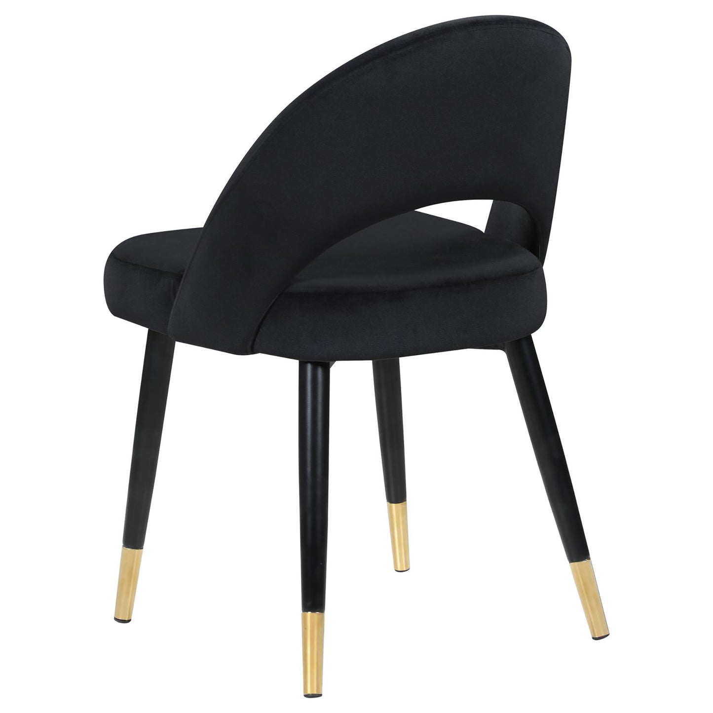 Black velvet dining chair with curved back and goldtipped tapered legs