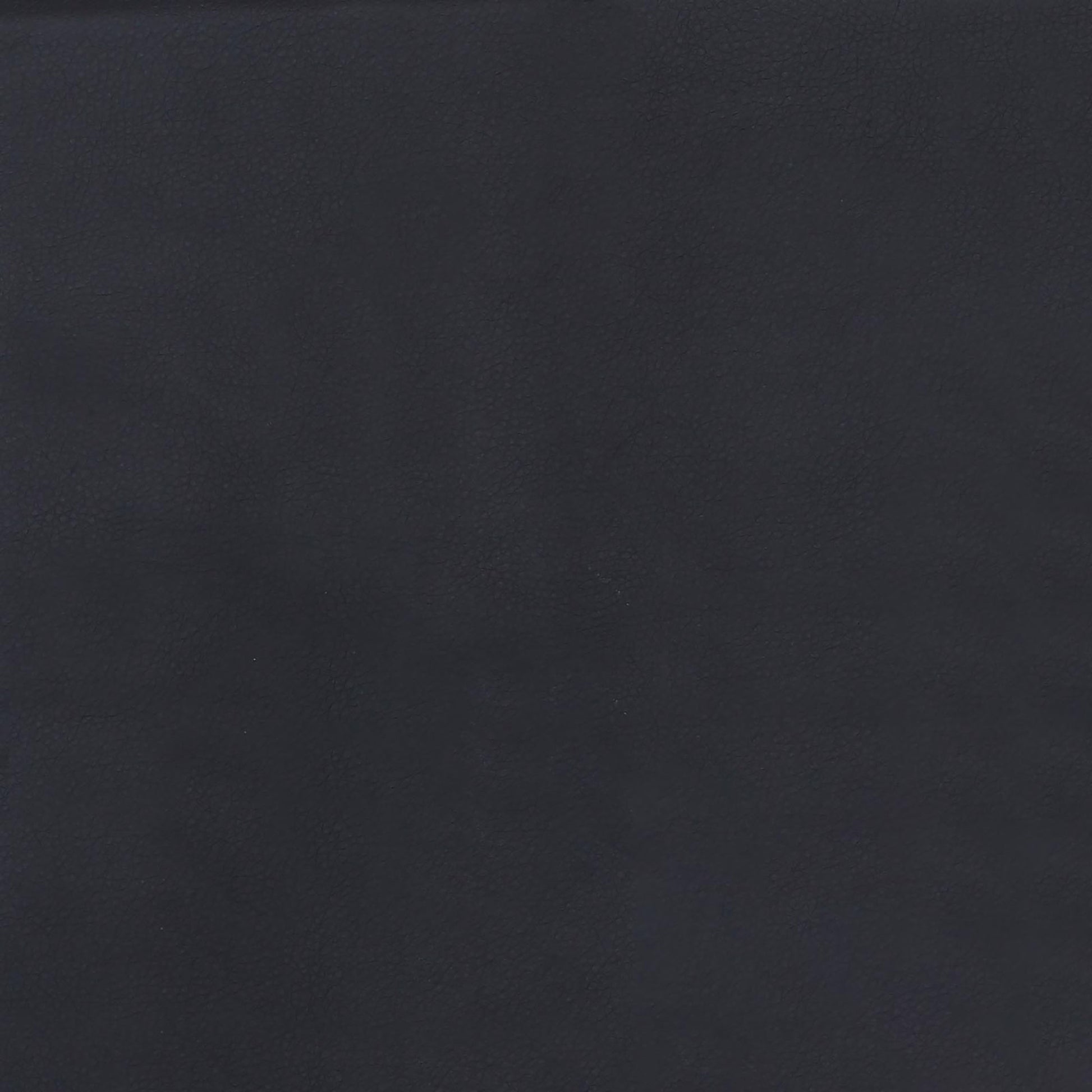 Dark gray pebbled leather upholstery swatch for furniture and car interiors