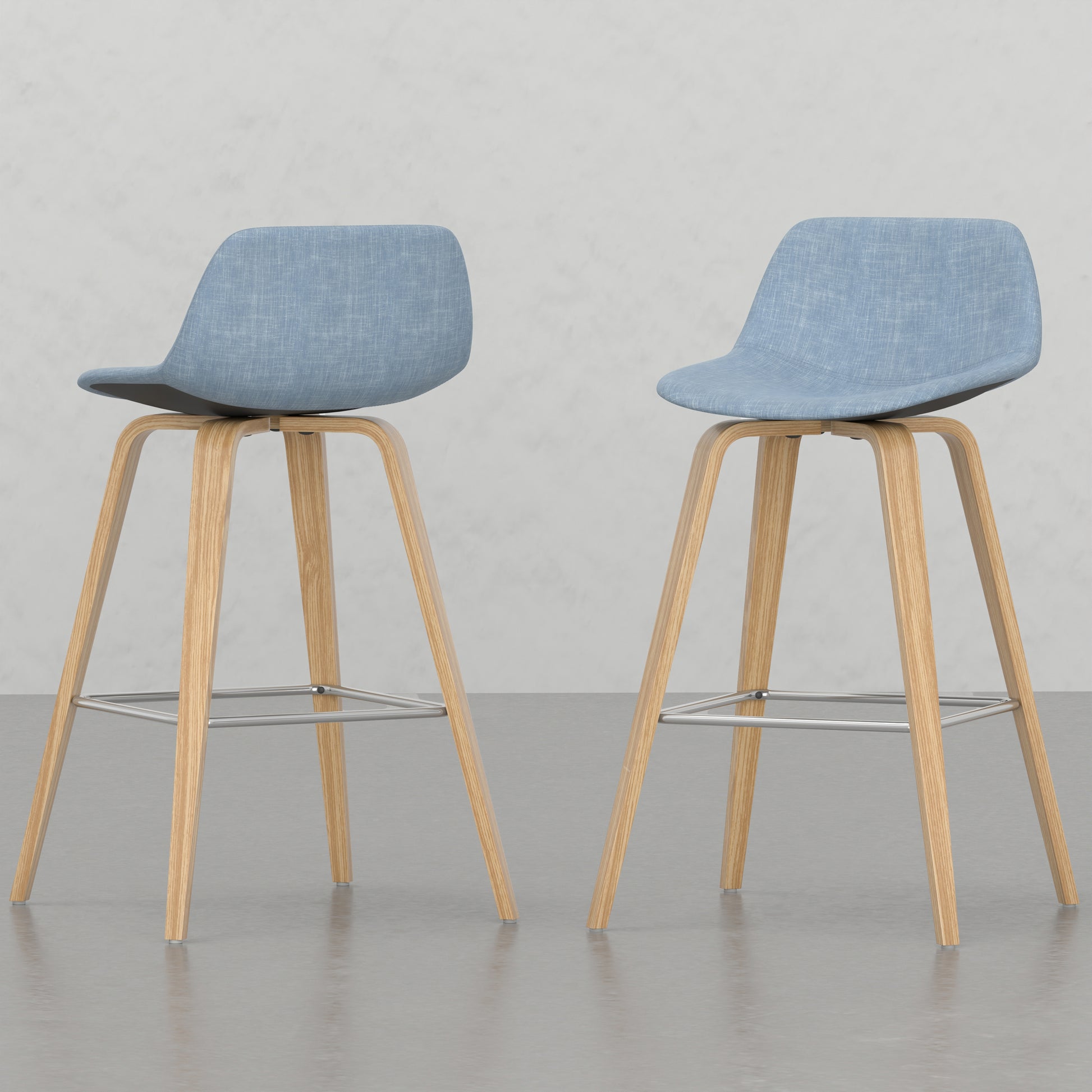 Light blue upholstered bar stool with natural wood legs
