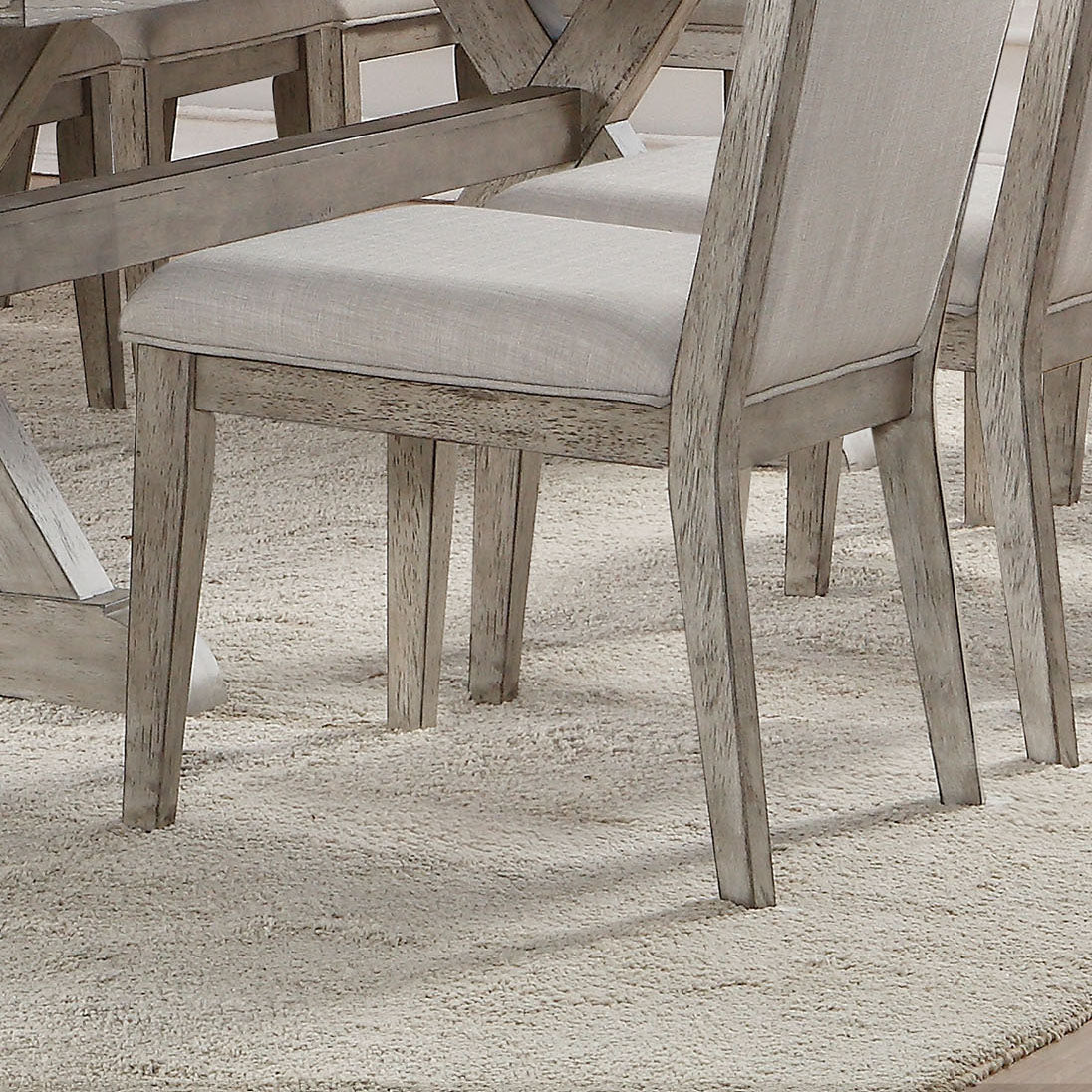 Distressed gray wood dining chairs with light gray upholstered seats set of