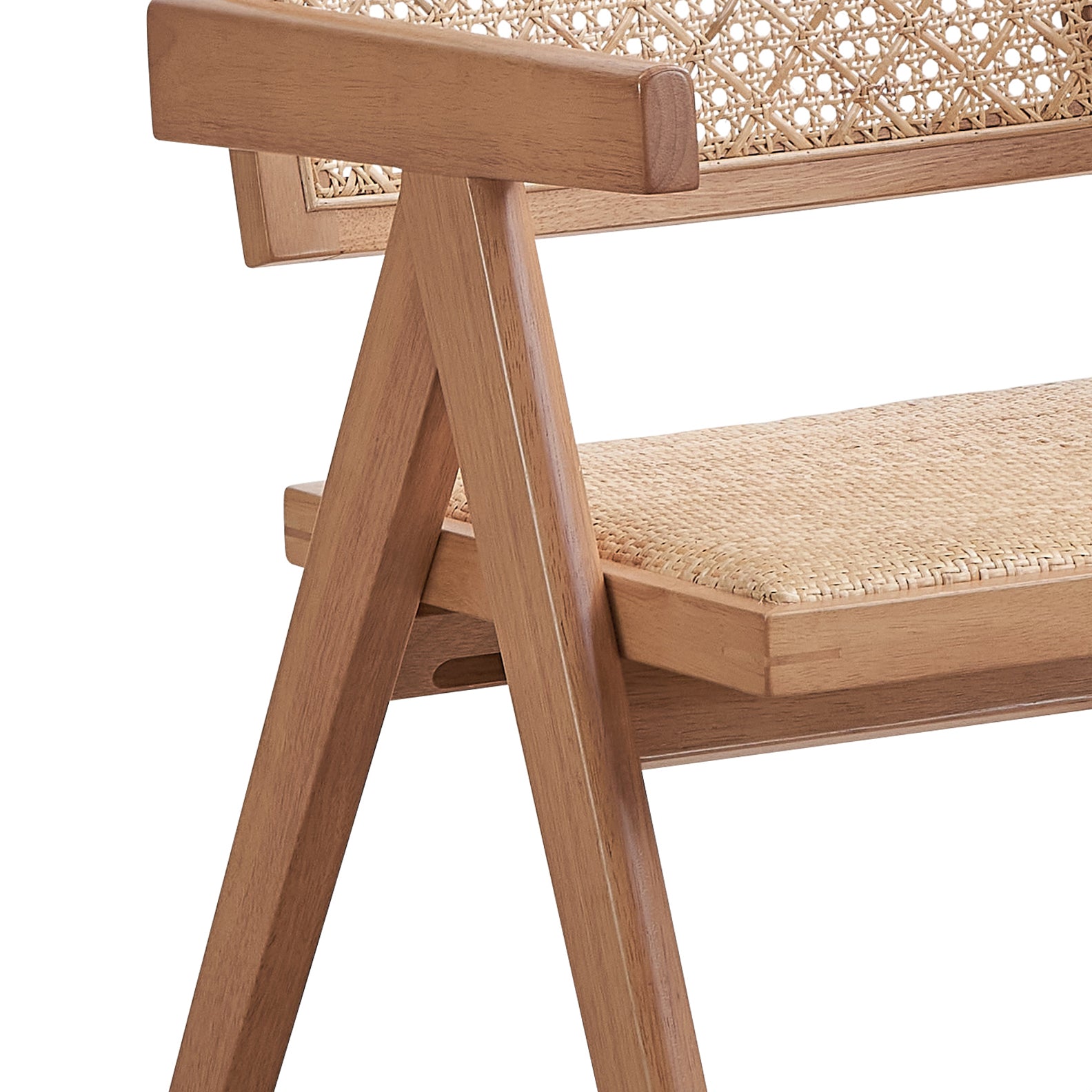 Natural wood armchair with woven rattan seat and backrest detail