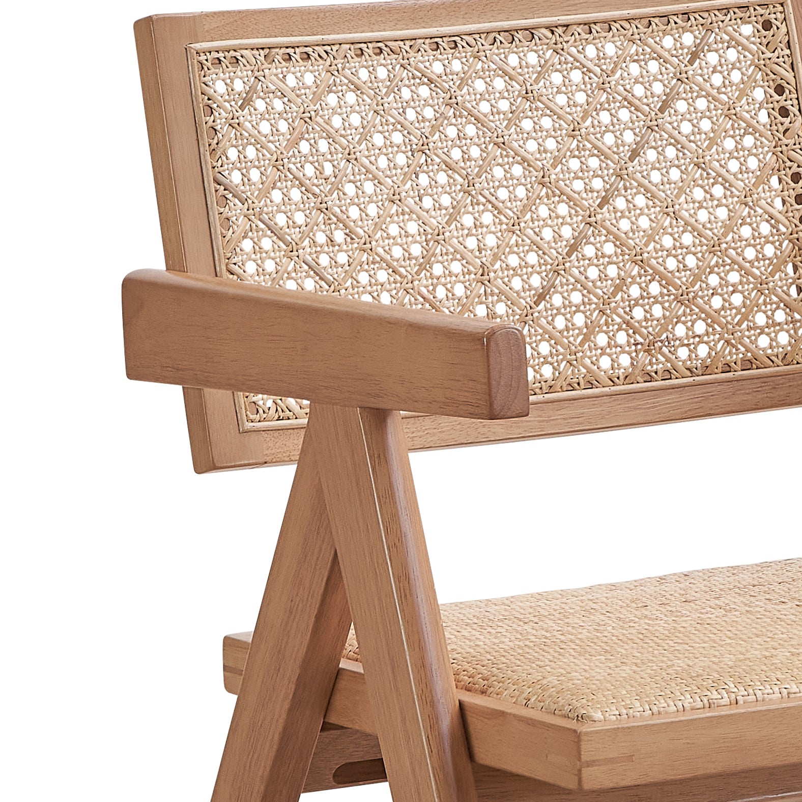Close up of a light wood chair with woven cane back and seat panel