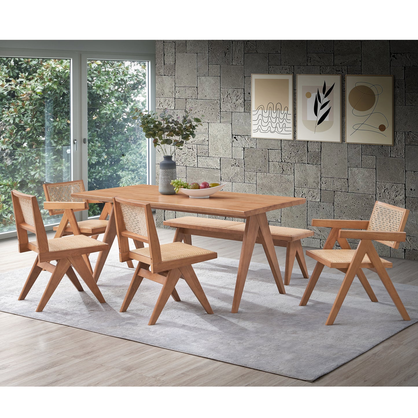 Wooden dining table with woven rattan chairs and bench for a modern dining room