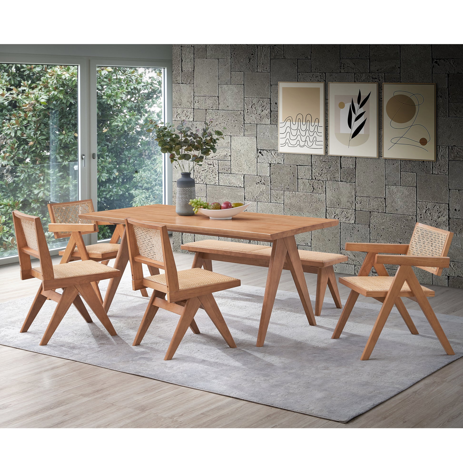 Wooden dining table with woven rattan chairs and bench for a modern dining room