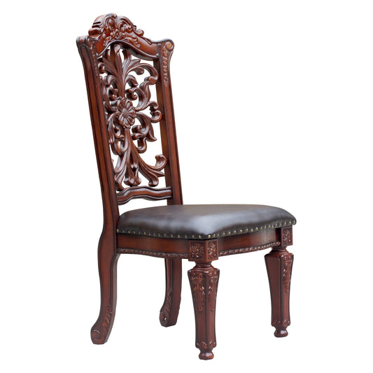 Ornate carved wood dining chair with dark brown leather seat