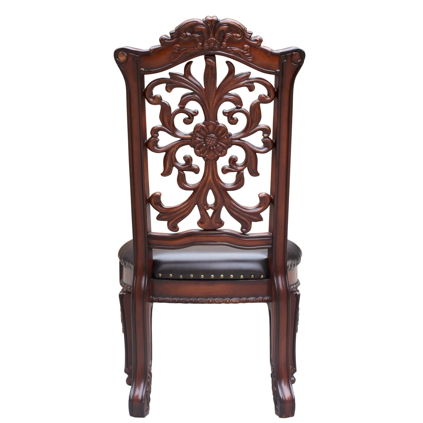 Ornate dark wood dining chair with carved floral backrest and brown leather seat