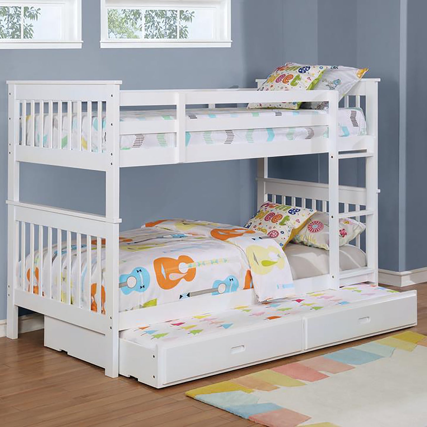 White wooden triple bunk bed with guitar print bedding and pullout trundle