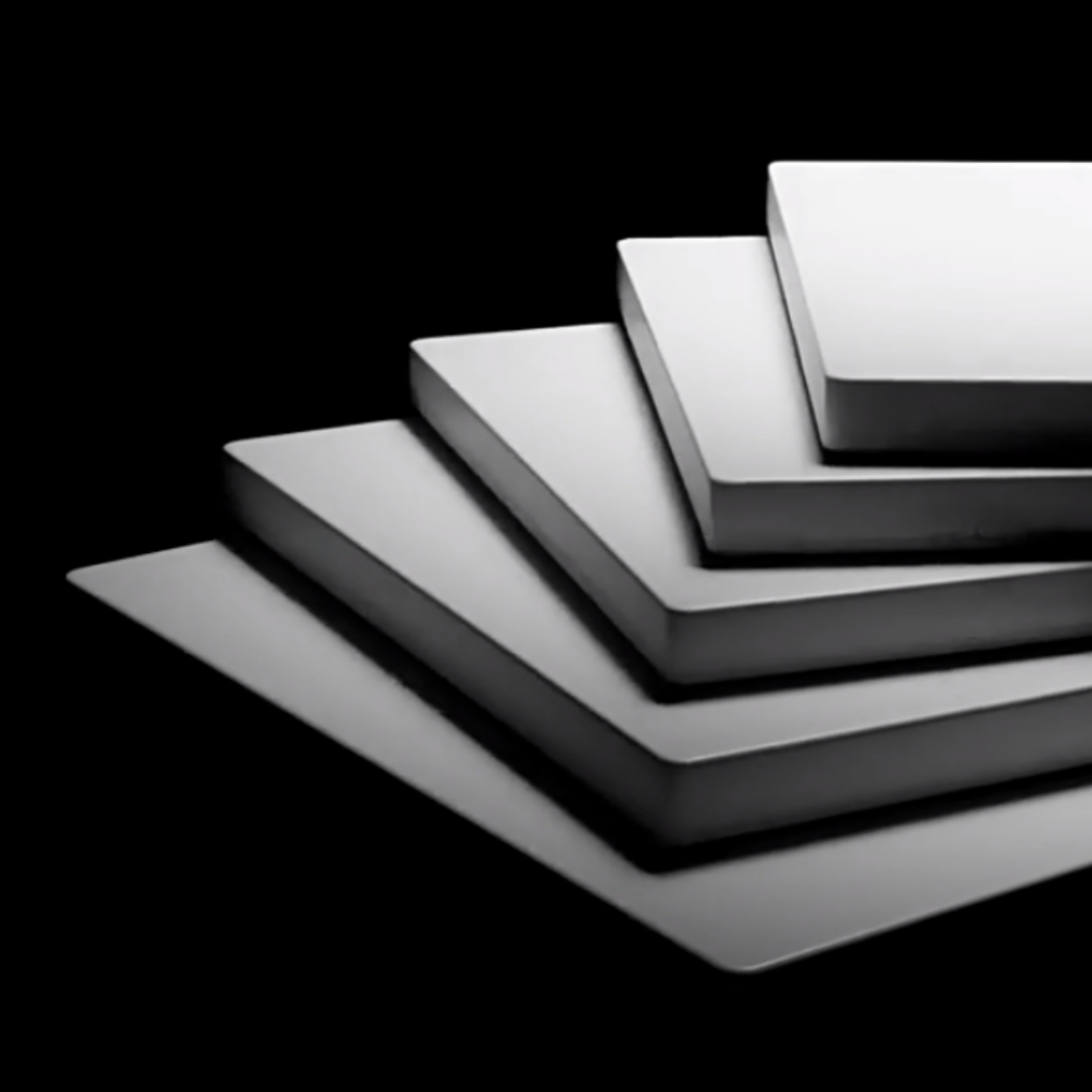 Stack of five square brushed metal tiles with rounded edges minimalist design
