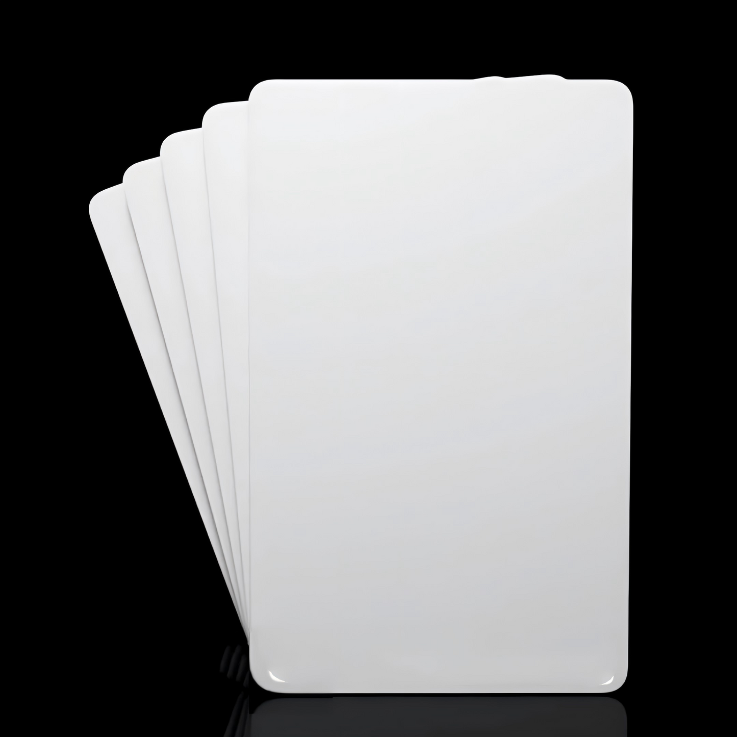Five blank white plastic cards fanned out perfect for loyalty programs or gift cards