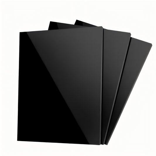Set of four sleek black square coasters perfect for protecting tabletops
