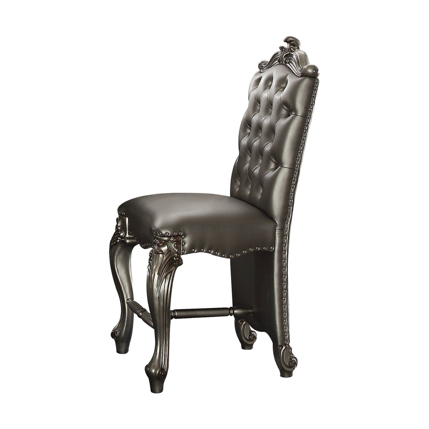 Ornate dark grey faux leather tufted bar stool with carved legs and silver nailhead trim