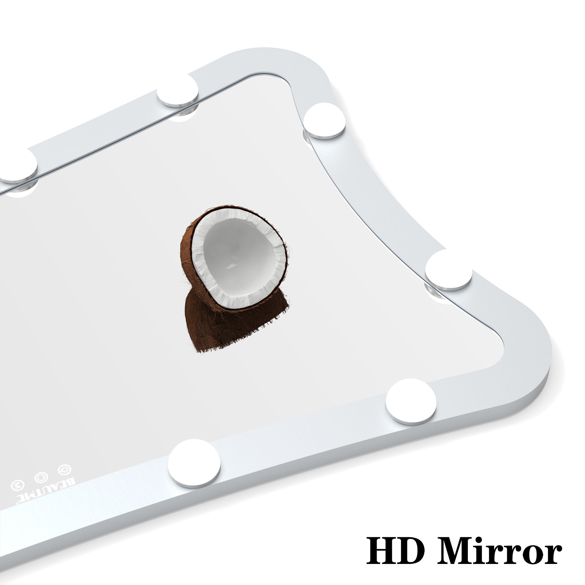 Split coconut reflecting in a large HD mirror with a silver frame