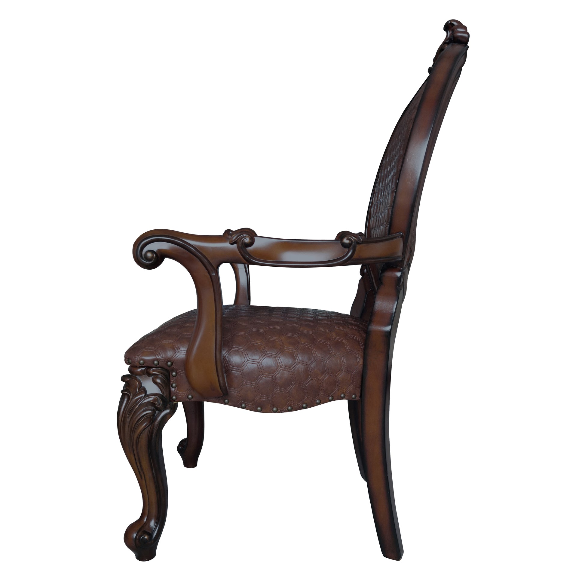 Ornate dark brown armchair with hexagonal quilted leather seat and carved wooden legs