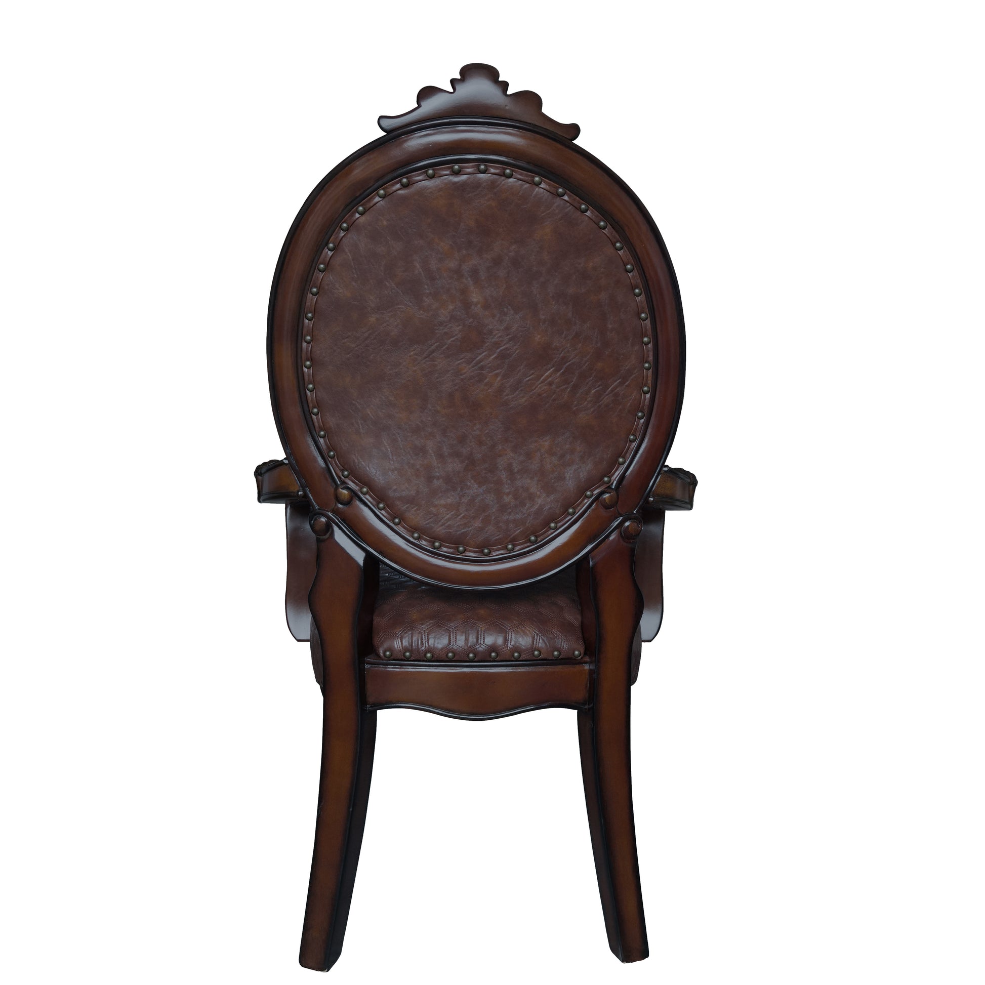 Ornate brown leather dining chair with carved wood frame and brass nailhead trim