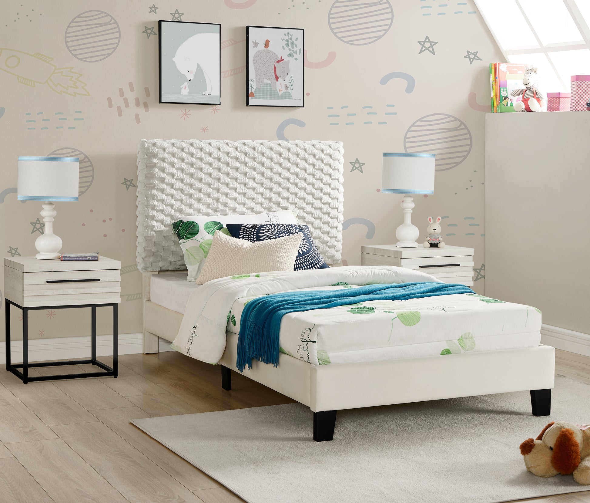 Cream upholstered twin bed with textured headboard and botanical print bedding