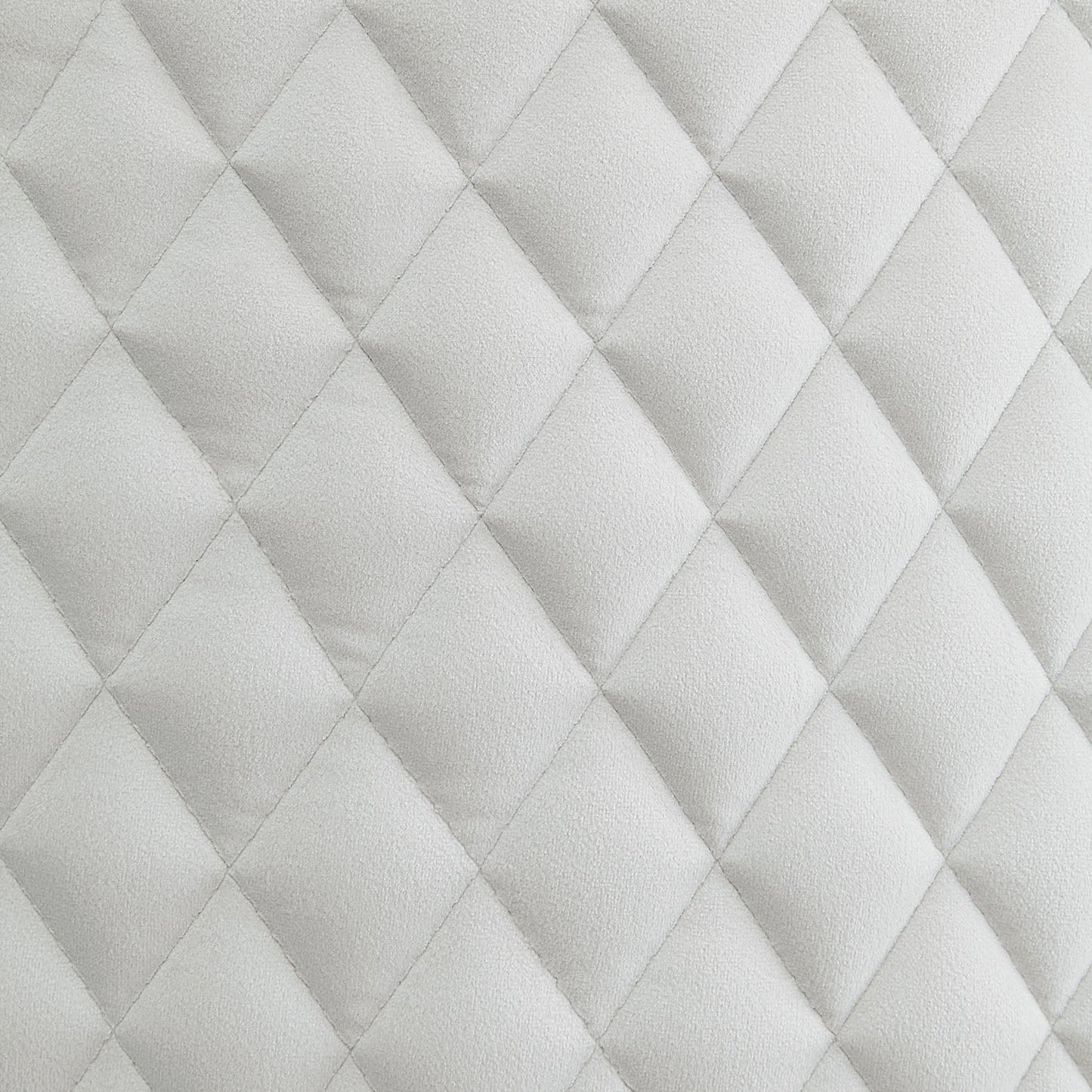 Soft white diamond quilted upholstery fabric detail perfect for furniture