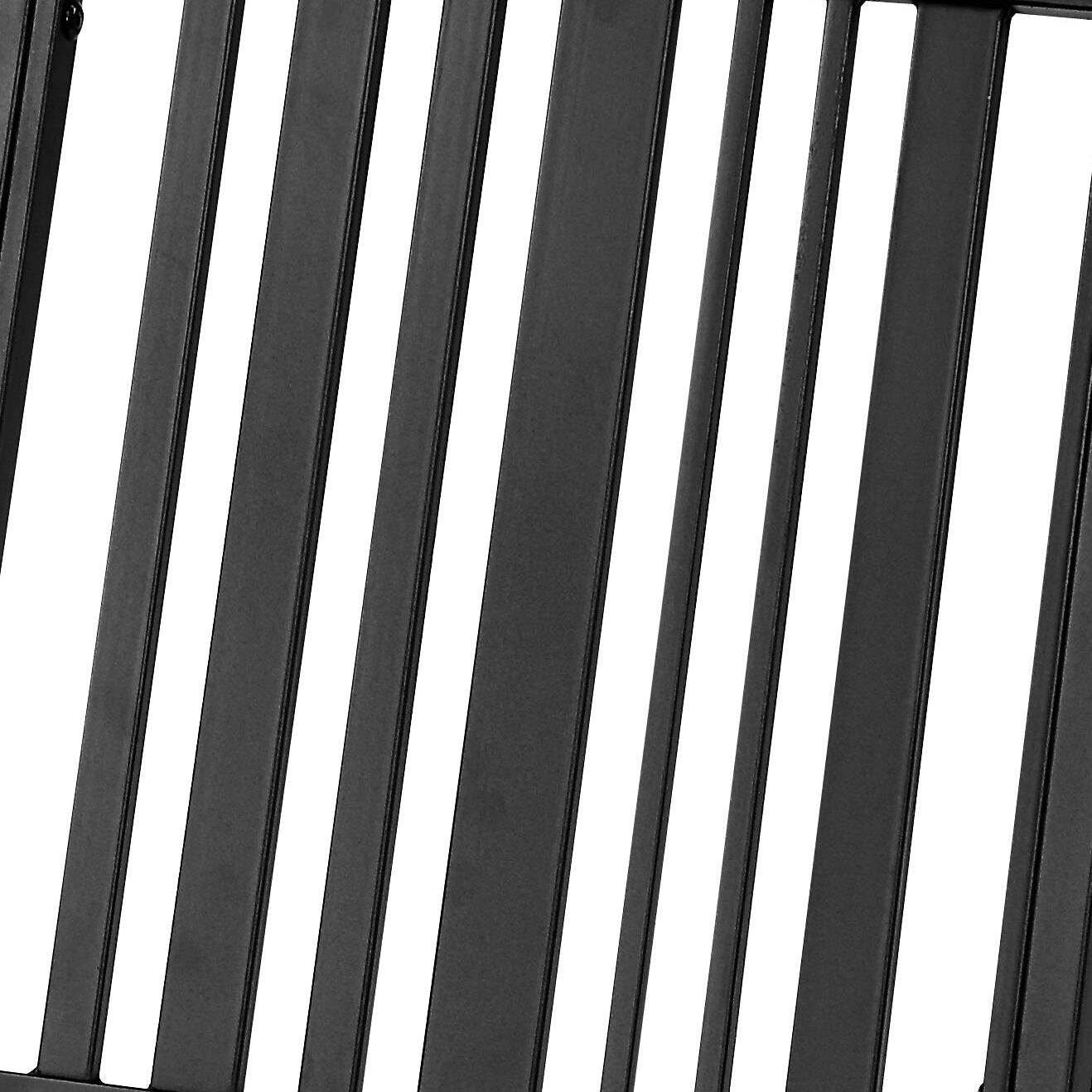 Closeup of black metal slats suggesting a modern railing
