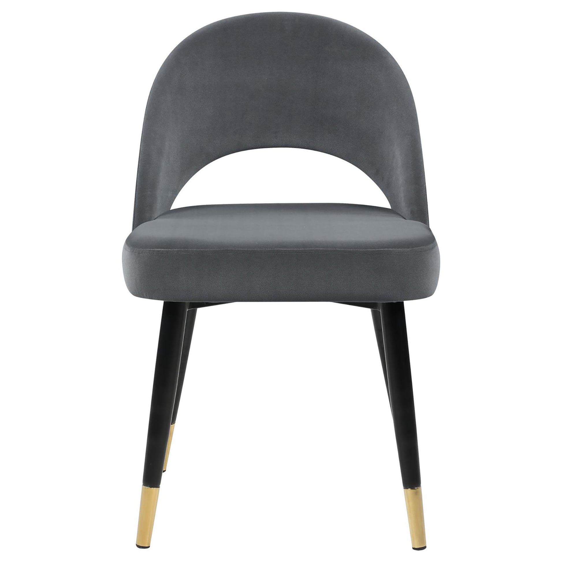 Elegant grey velvet dining chair with modern black legs and gold accents ideal for contemporary kitchens