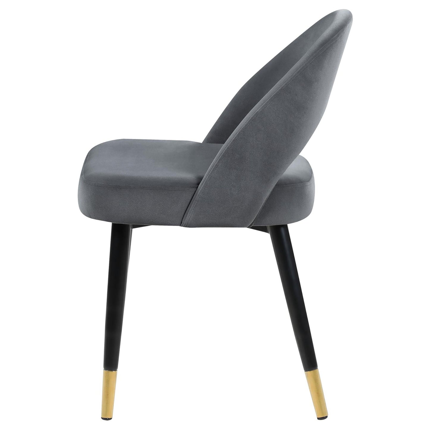 Modern grey velvet chair with tapered black legs and gold accents
