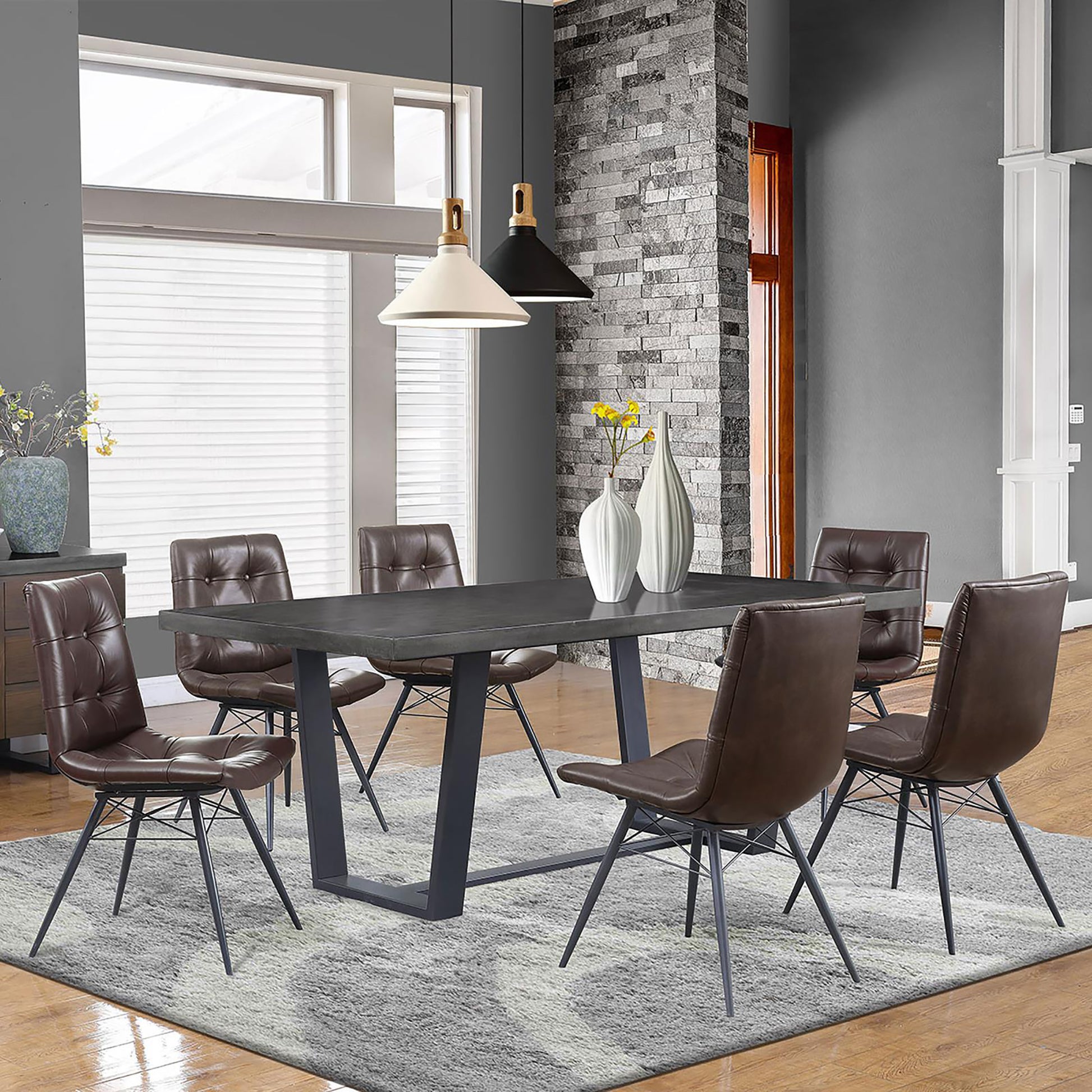 Tufted brown faux leather dining chairs with black metal legs arranged around a dark gray rectangular dining table