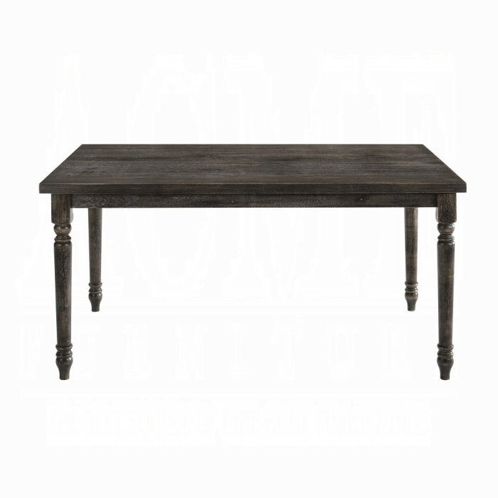 Dark wood dining table with turned legs perfect for farmhouse kitchens