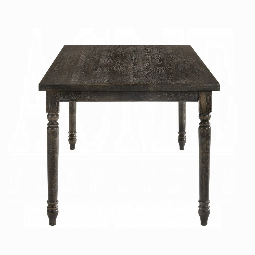 Dark wood farmhouse dining table with turned legs