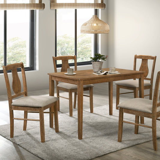 Solid wood dining table and four chairs with upholstered seats on a shag rug