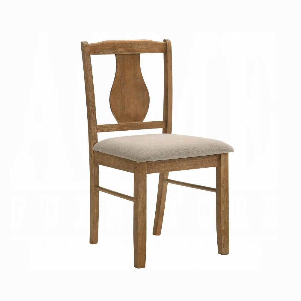 Wooden dining chair with a light gray upholstered seat and decorative back detail