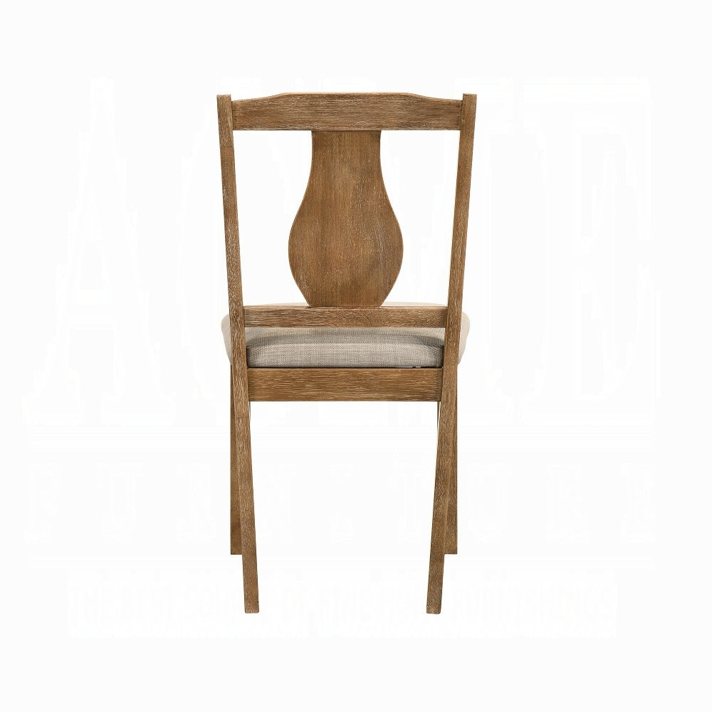 Rustic oak dining chair with upholstered seat and carved back
