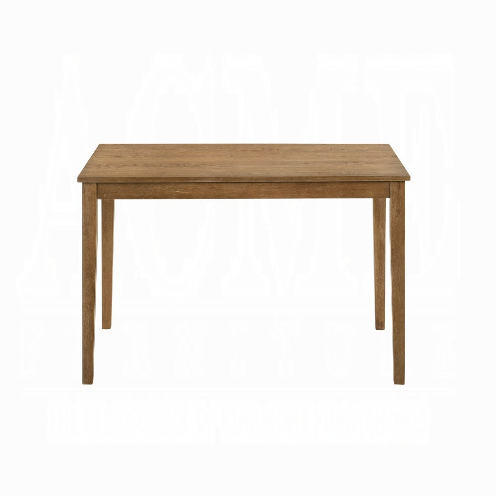 Rectangular solid wood dining table with a natural oak finish seats four