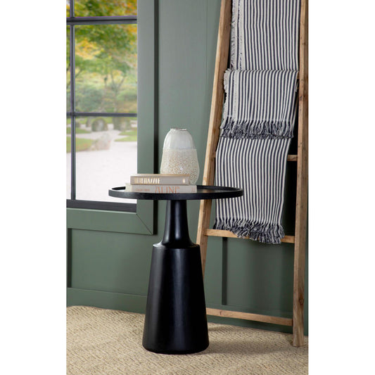 Black pedestal side table with books and textured vase modern accent decor