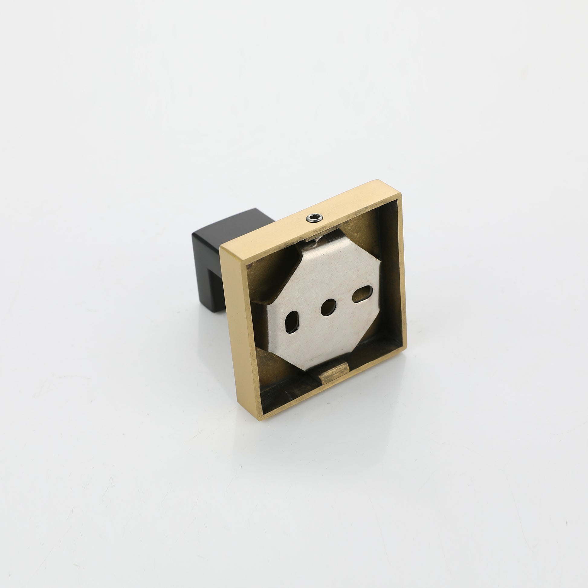 Modern brass and black cabinet pull with a square base