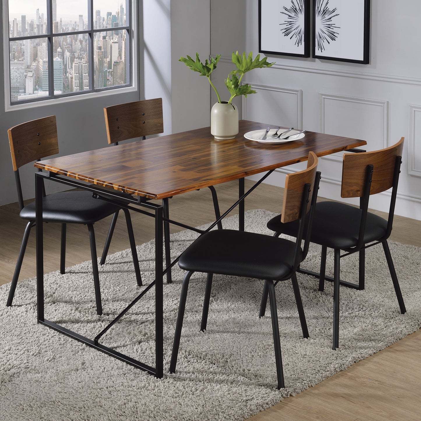 Industrial dining set with wooden tabletop black metal frame and four black chairs