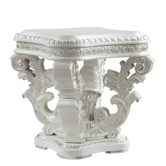 White ornate end table with carved floral accents perfect for a luxurious living room