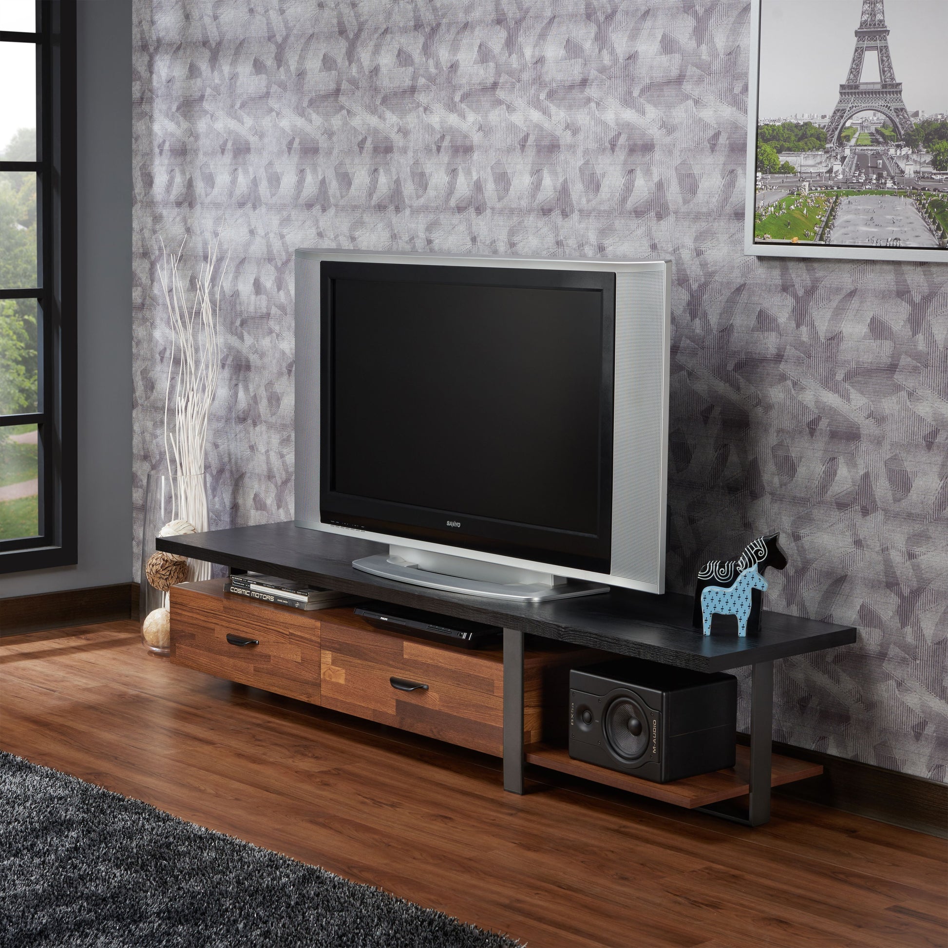 Sleek black TV stand with natural wood drawers and metal frame perfect for living rooms