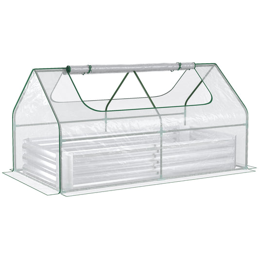 Clear PVC mini greenhouse with green trim protecting a raised garden bed