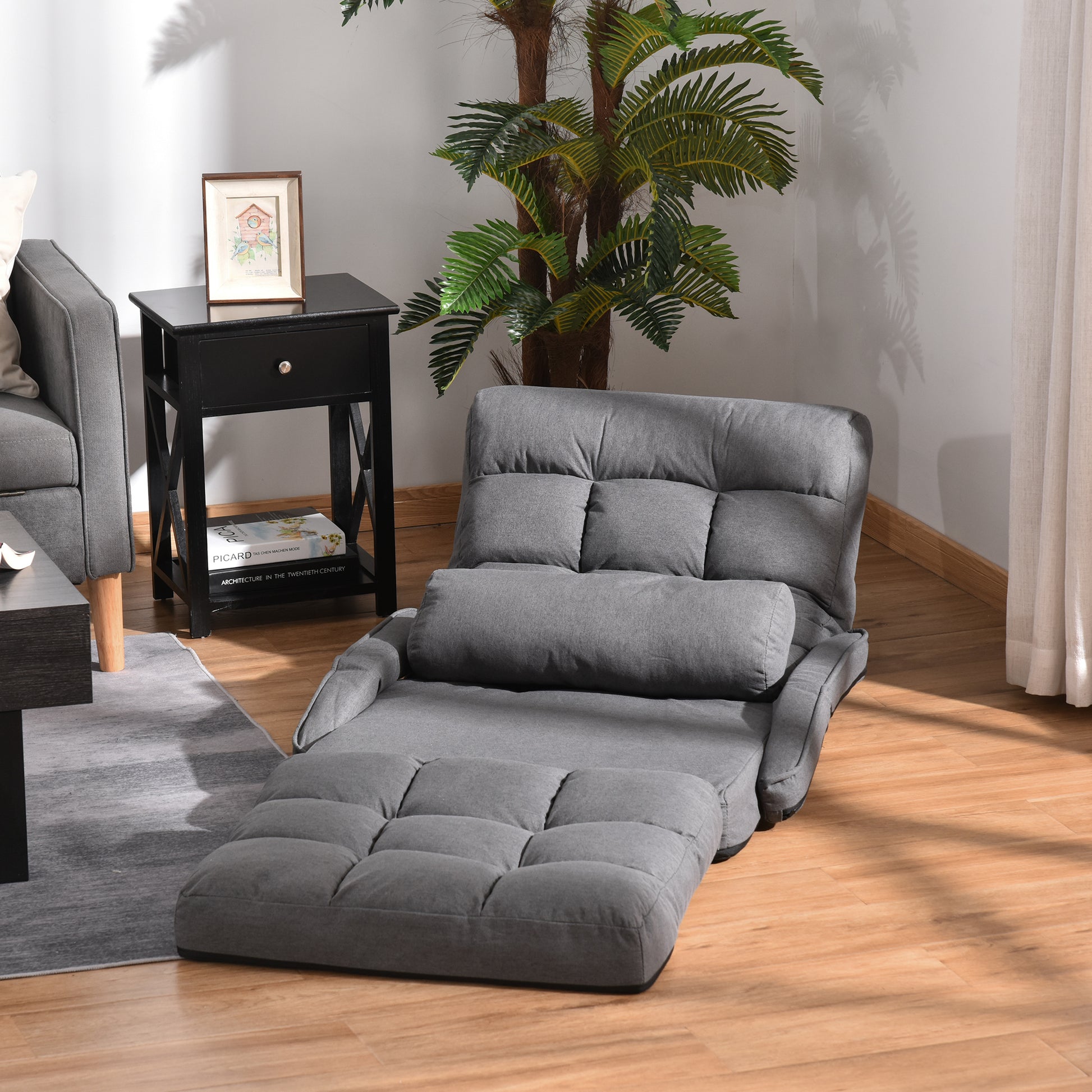 Grey fabric floor sofa with adjustable backrest and footrest