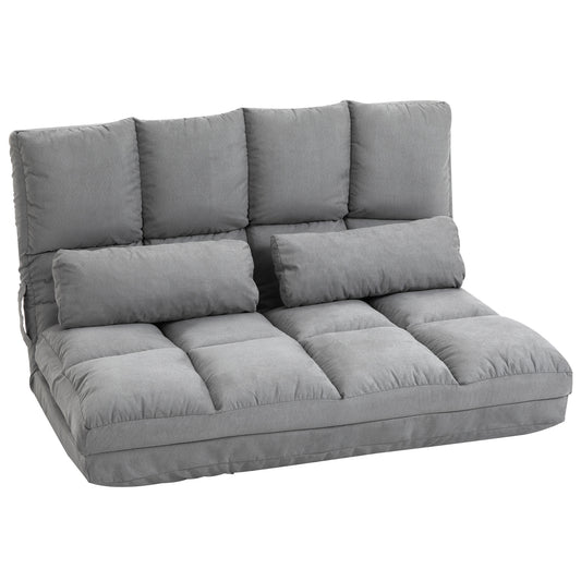 Grey fabric futon sofa with multiple cushions converts for seating or sleeping