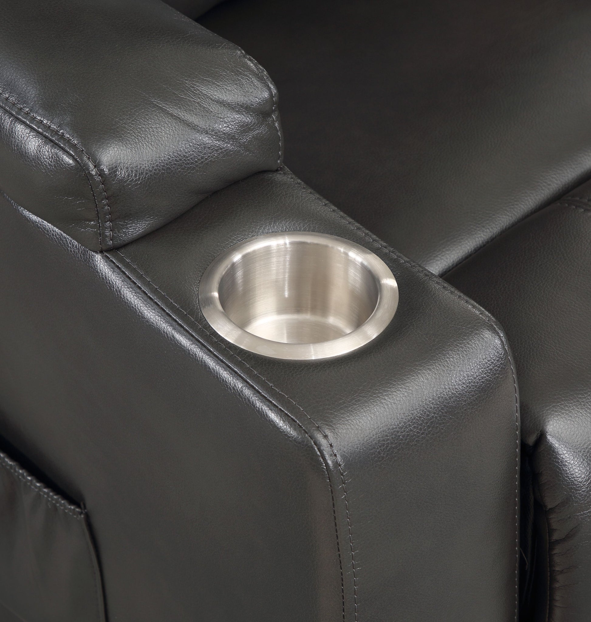 Black leather recliner armchair with builtin stainless steel cup holder on armrest