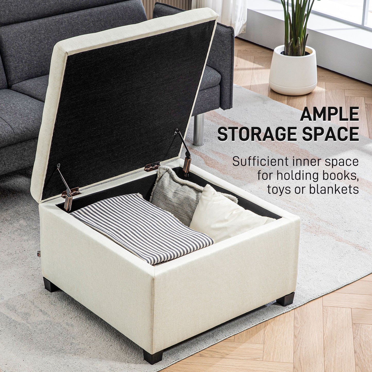 Cream upholstered storage ottoman with lifttop lid revealing ample storage space