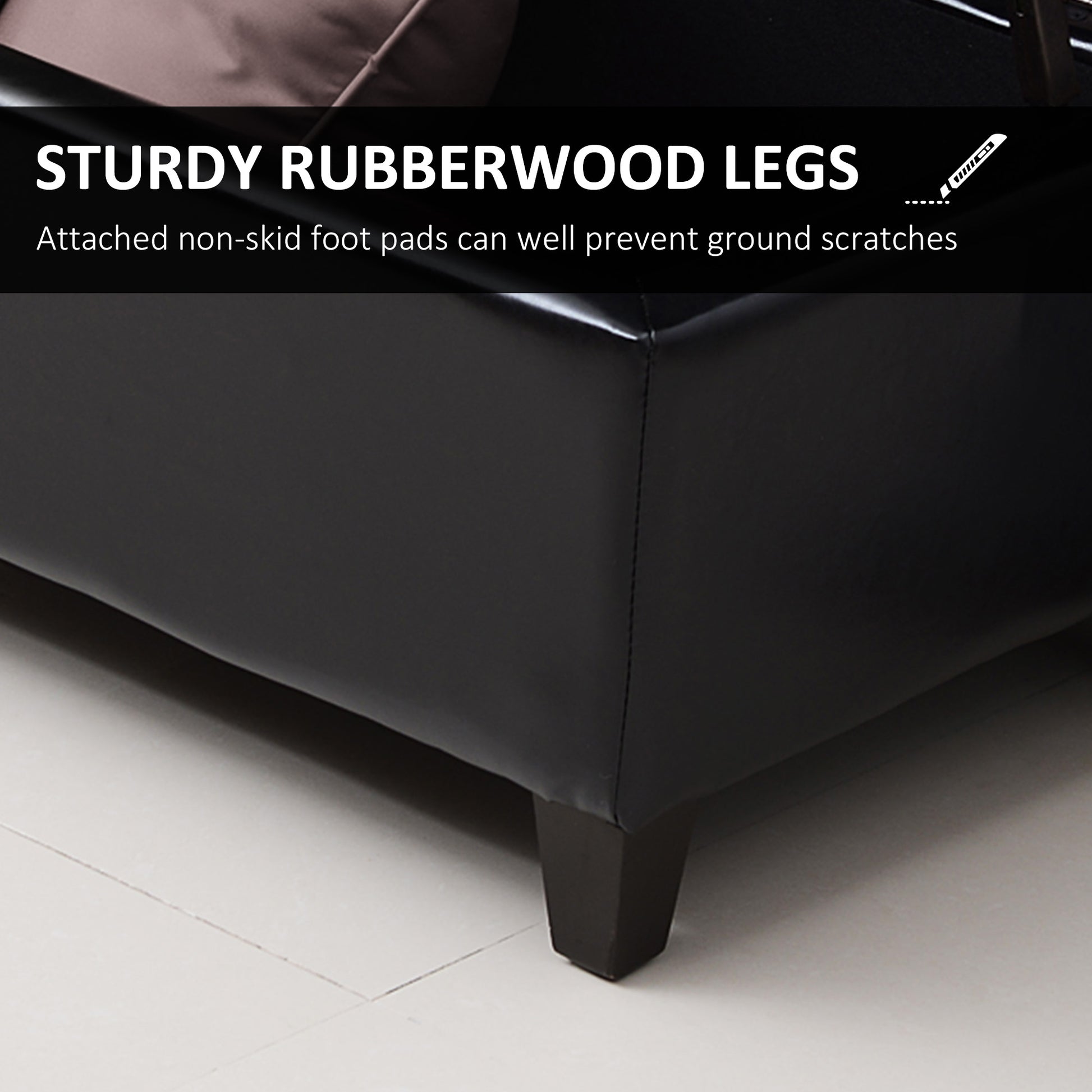 Black faux leather ottoman with sturdy rubberwood legs