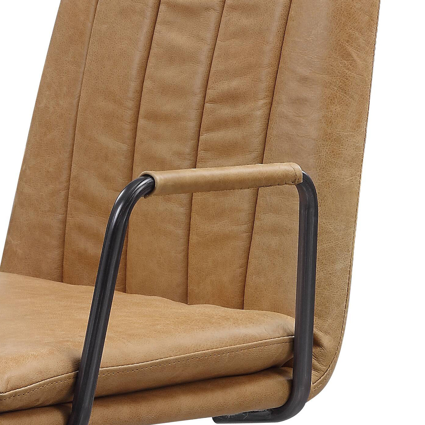Tan leather accent chair with channel tufting and black metal arms